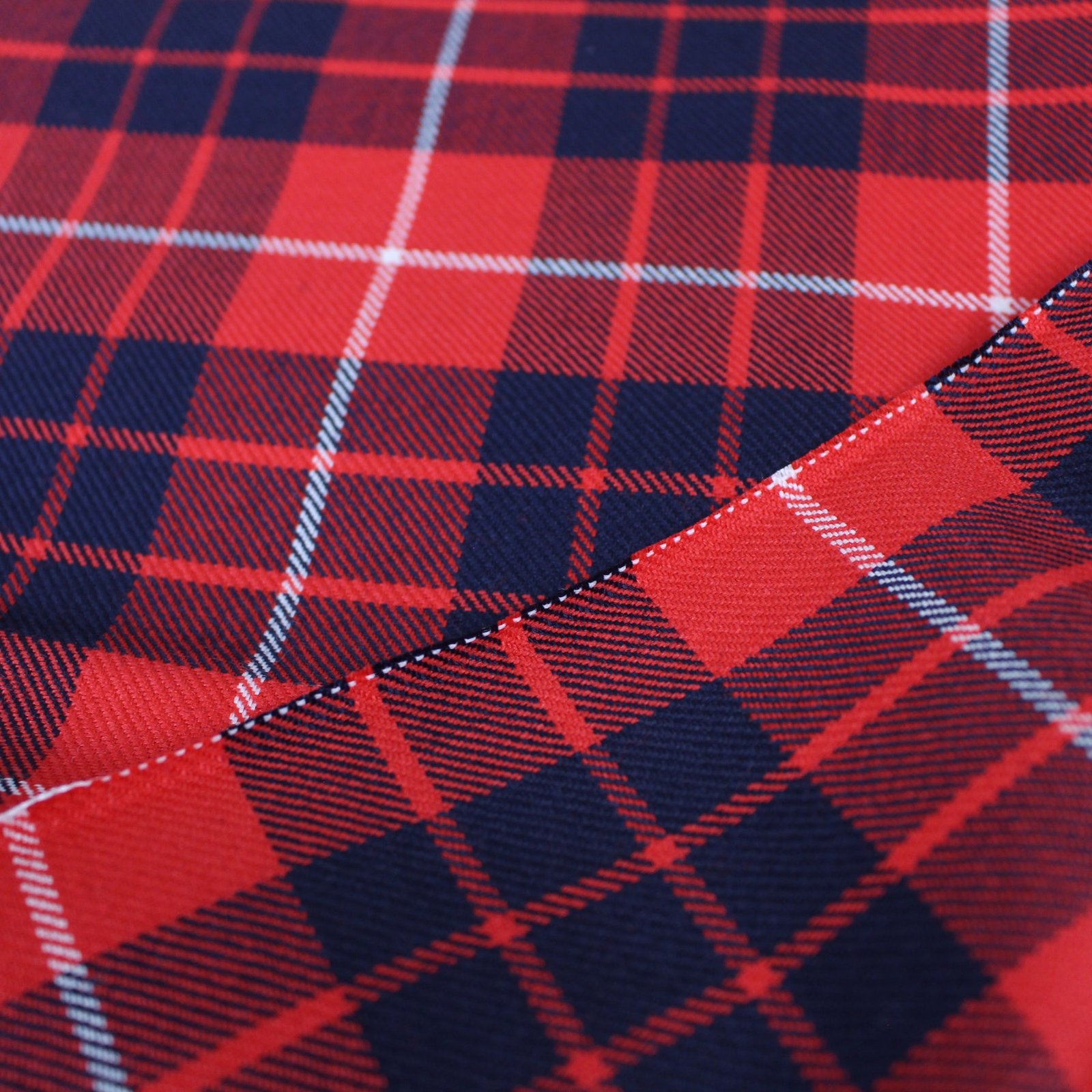 Premium red and navy plaid fabric with white intersecting stripes