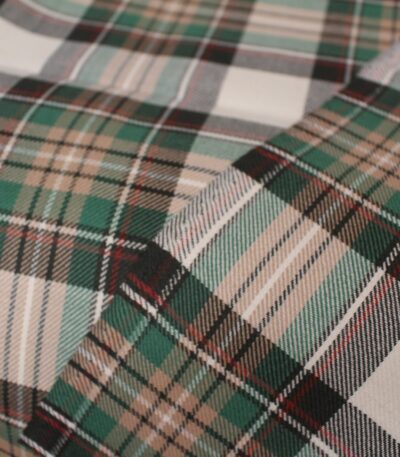Premium sage and cream plaid flannel fabric with charcoal and rust stripes