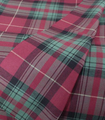 Tartan bedding material in maroon and sage green
