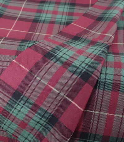 Bulk cotton flannel fabric in maroon and teal green tartan pattern