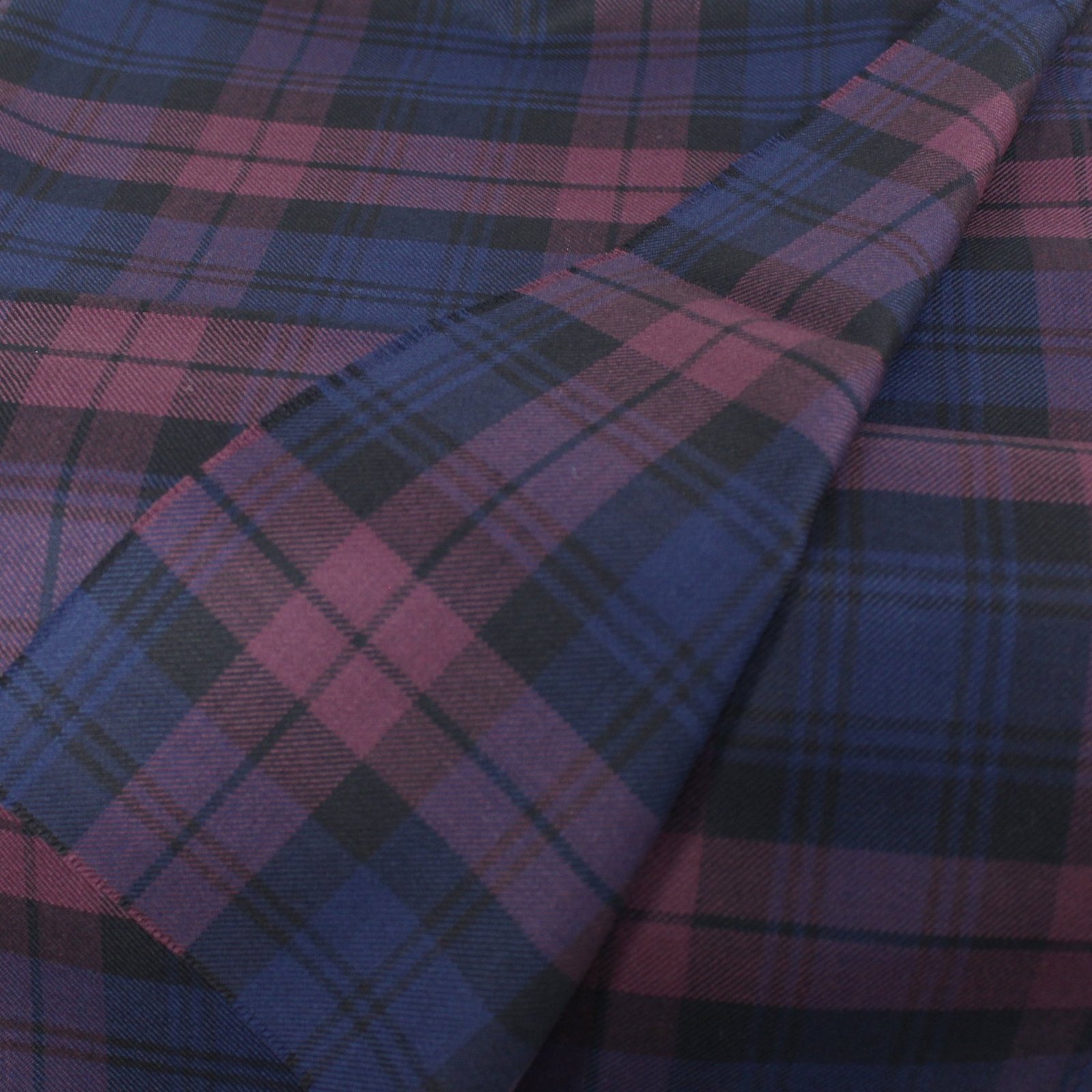 Export quality flannel fabric in purple and navy tartan