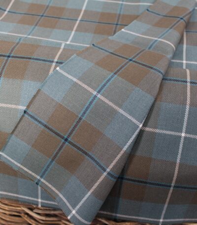 Premium yarn dyed textiles in slate blue and taupe tartan pattern