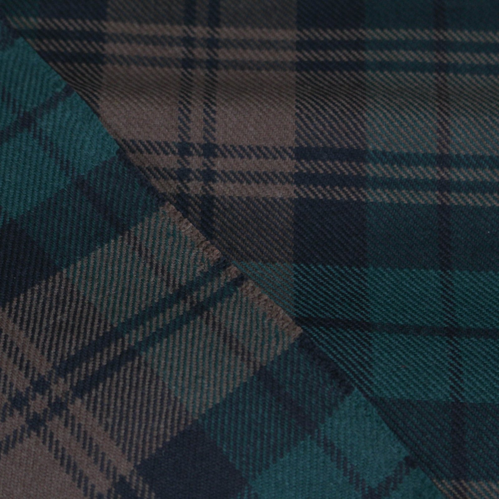 Professional textile sourcing Pakistan: deep teal and taupe plaid flannel