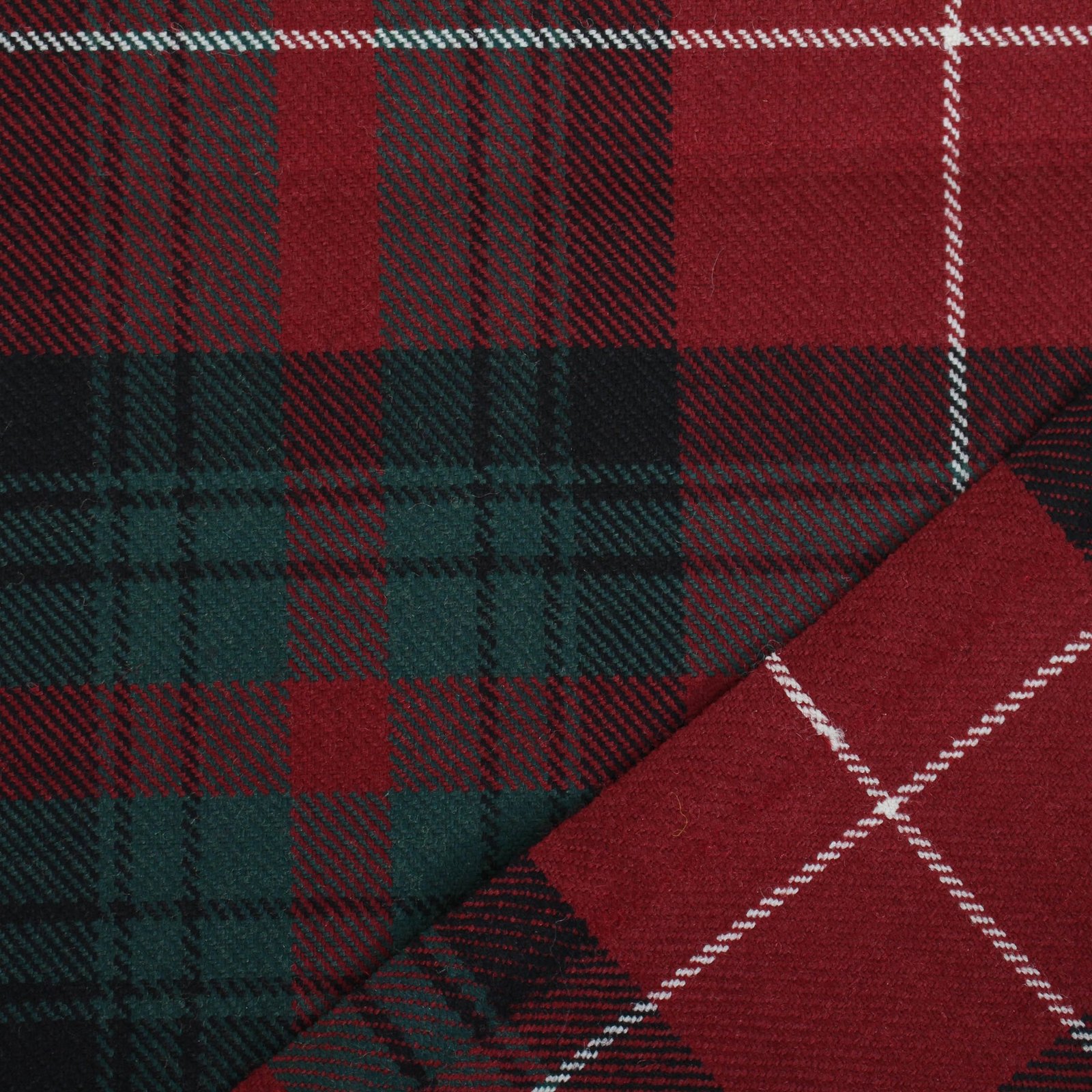 100% cotton Royal Stewart Tartan fabric in deep red and green, exported from Multan, Pakistan.